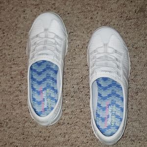 White slip on Skechers